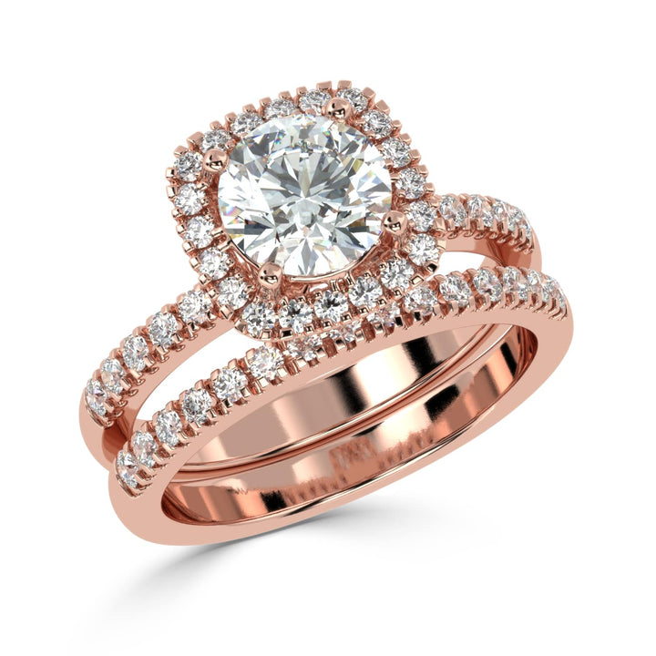 Eternal Brilliance: Round Solitaire Ring with Diamond Halo and Diamond-Studded Shank, paired with a Diamond Accent Band