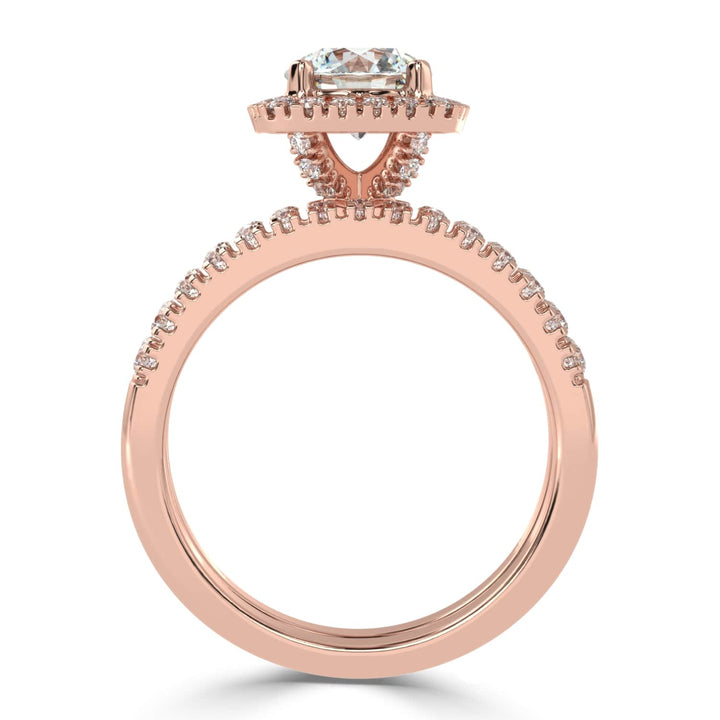 Eternal Brilliance: Round Solitaire Ring with Diamond Halo and Diamond-Studded Shank, paired with a Diamond Accent Band