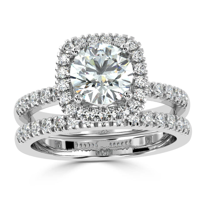 Eternal Brilliance: Round Solitaire Ring with Diamond Halo and Diamond-Studded Shank, paired with a Diamond Accent Band