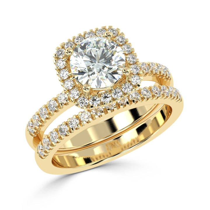 Eternal Brilliance: Round Solitaire Ring with Diamond Halo and Diamond-Studded Shank, paired with a Diamond Accent Band