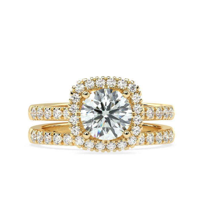 Eternal Brilliance: Round Solitaire Ring with Diamond Halo and Diamond-Studded Shank, paired with a Diamond Accent Band